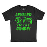 Youth Funny T Shirts Leveled Up to 1st Grade Sarcastic Video Game Graphic Novelty Graduation Tee for Kids